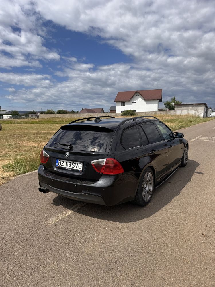 Vând e91 330d