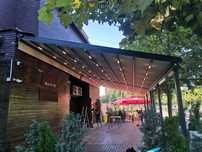Pergola retractabila