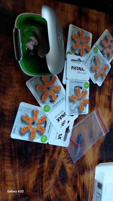 Слуховой аппарат - *РHONAK* . Новый, с батарейками.