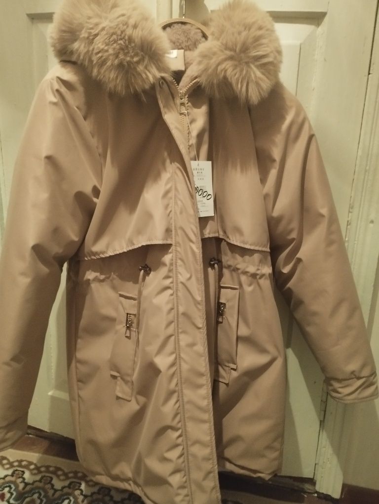 Продам женскую куртку