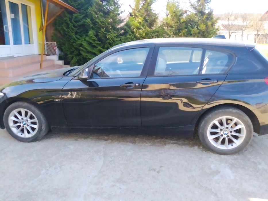 BMW 116i, fabricație 2012 
- keyless go
- dublu climatronic
- star&