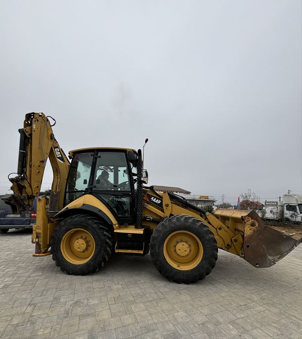 Buldoexcavator CAT 444 F . 2015