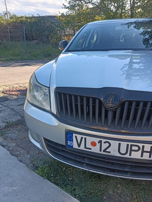 vând  SKODA Octavia 2 sau schimb