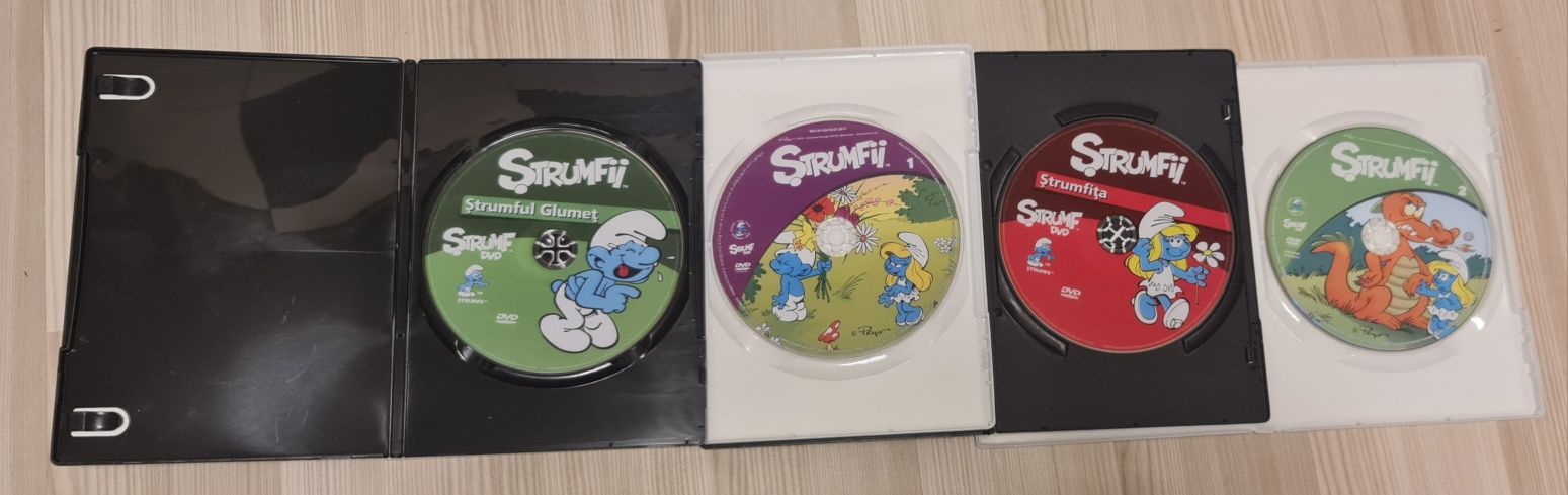 Ștrumfii,DVD-uri 1 Film și 7 Desene Animate,În stare foarte bună.