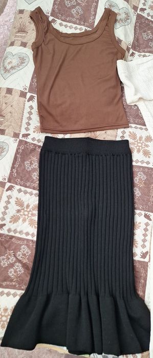 Обмен на Соленья две юбки, кофта и топик и топик