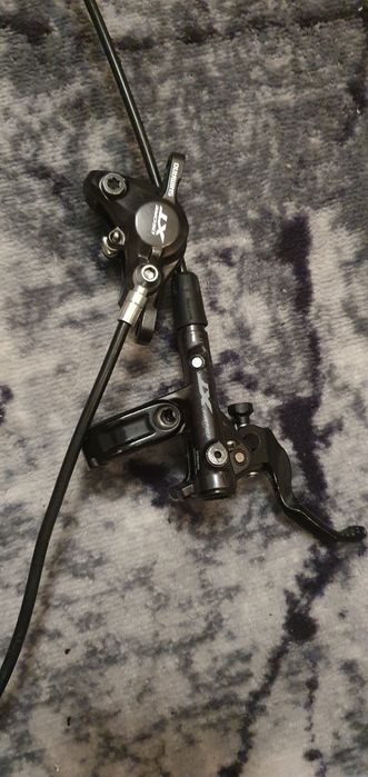 Vând frana shimano xt deore