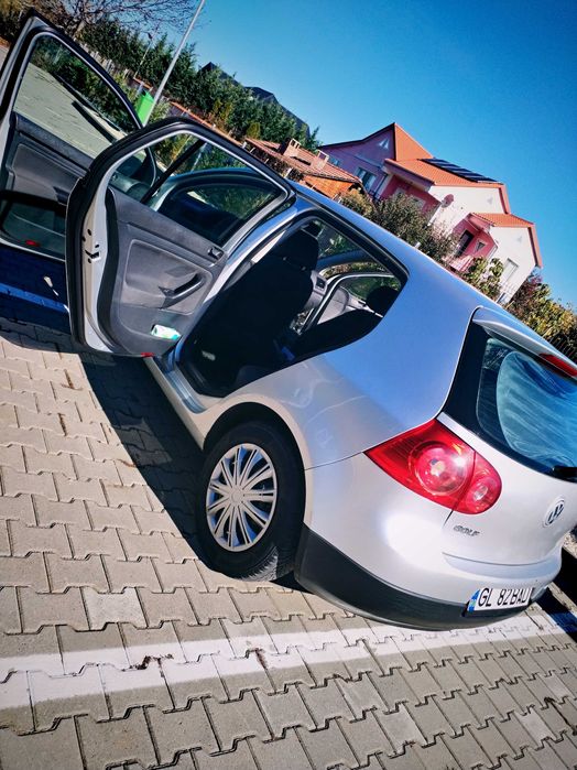 Vând golf 5 .1,4 benzina
