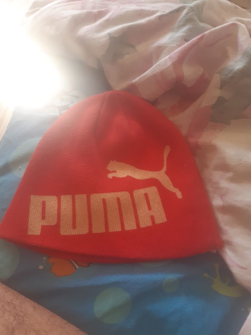 Продавам чисто нова шапка за зимата на puma