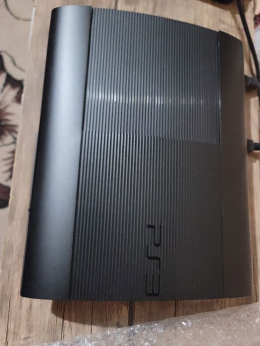 Playstation 3 super slim 500 gb 12 ta uyin bor yangi  2 haftalik