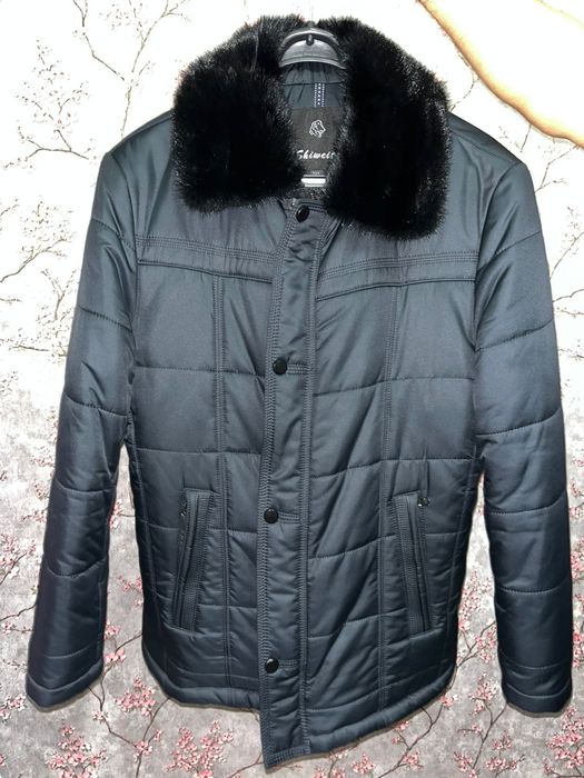 Продам мужские зимние куртку Размер 50 цвет тёмный синий