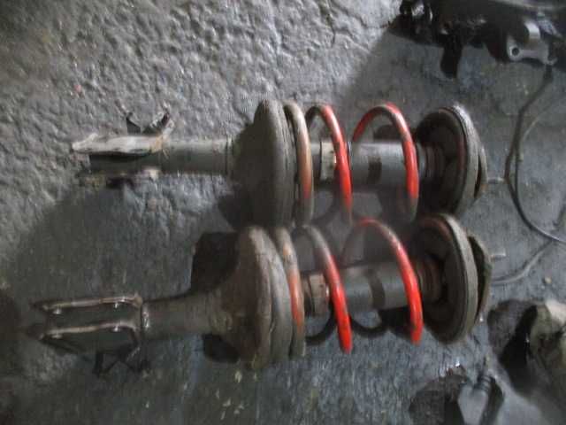 Amortizoare arcuri flanse fata MITSUBISHI LANCER an 2006 originale