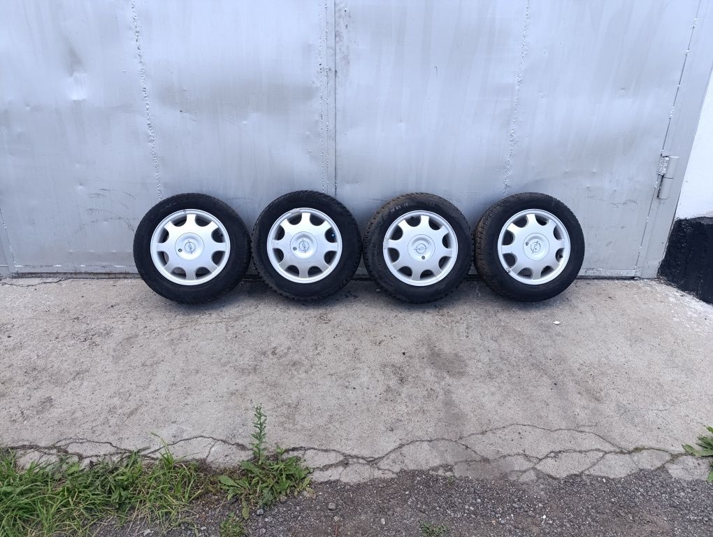 Диски л.п R14 с резиной 4*100 на Опель