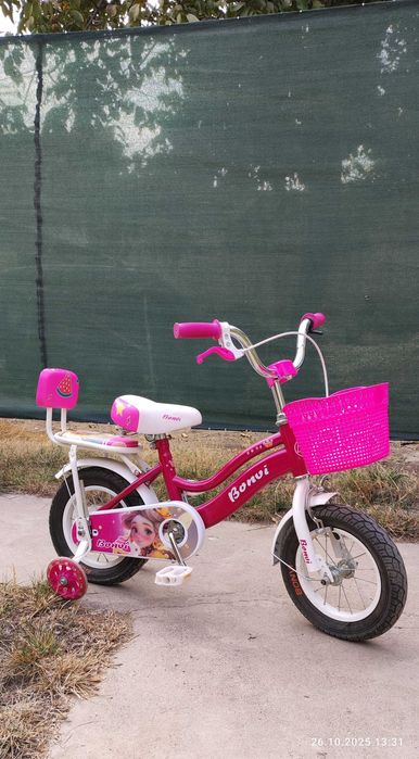 Б/у детский велосипед, с дополнительными колёсами.