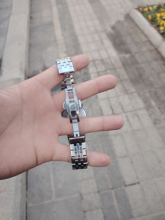 Rolex soati kumush rang