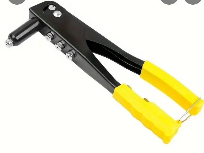 Заклёпочной пистолет жёлтого света.