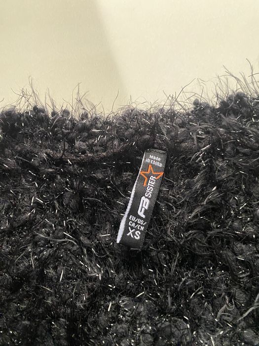 Pulovar negru fu fir argintiu