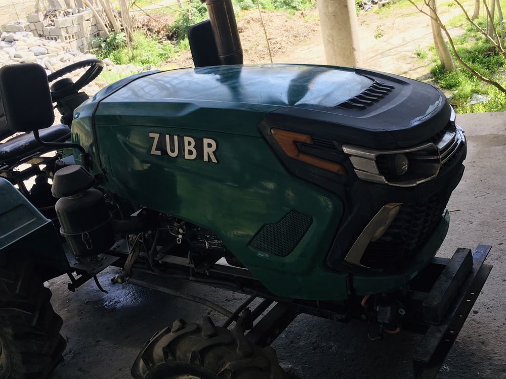 Traktor kafolatli