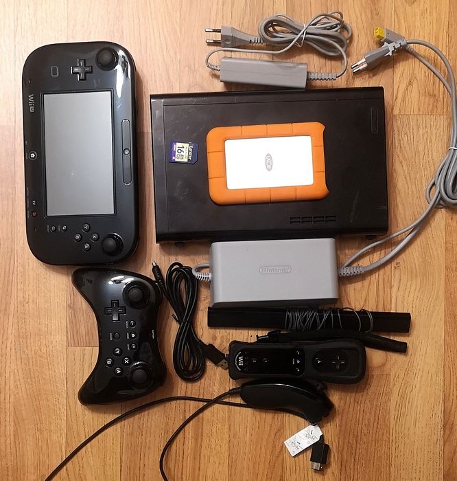 Consola Nintendo WiiU modată + accesorii+ 140 jocuri