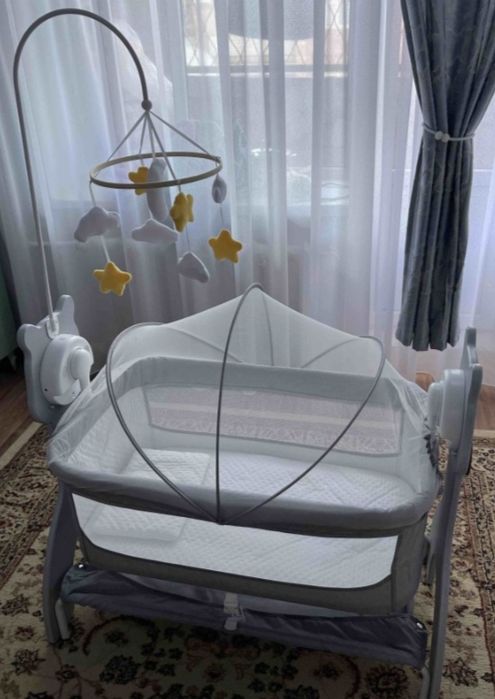 Продам кроватку музыкальная самоукачивающаяся новая