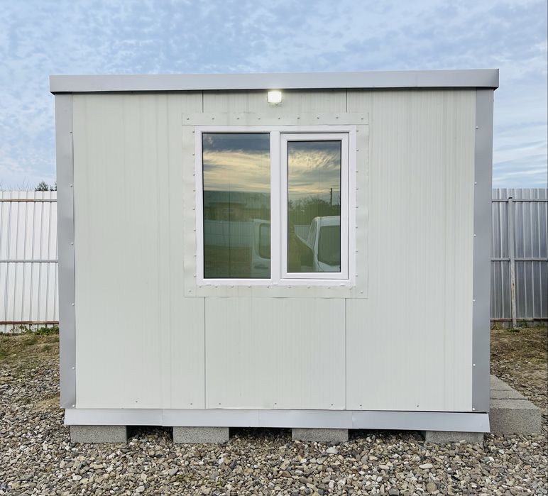 Vand hala 200 mp din tabla 0,5 plus teren 6600 mp com. Brusturi