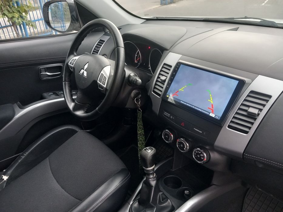 Mitsubishi Outlander an 2012 . Euro5.  7LOCURI.