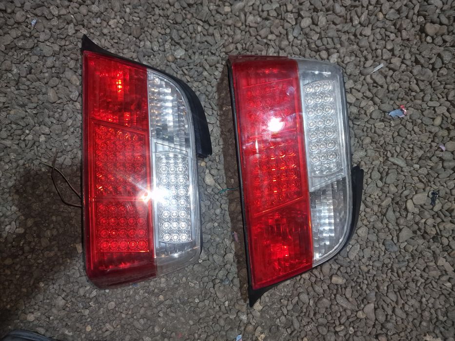 Vand Faruri cu lupa Bosch originale + Stopuri LED DEPO de Bmw e36