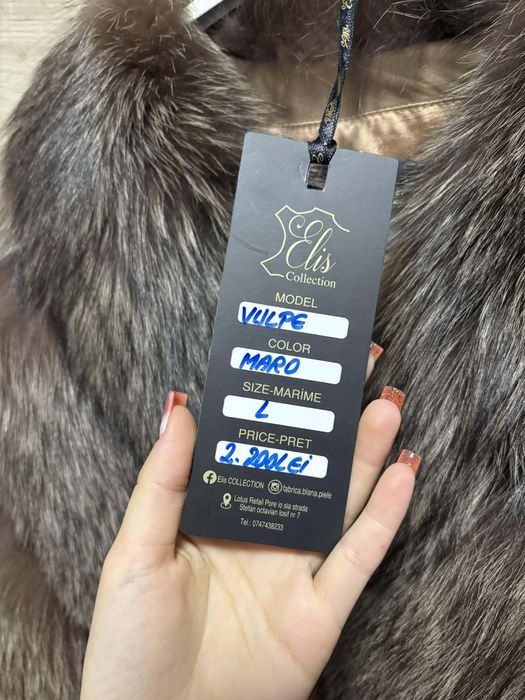 Haina de blană nepurtata