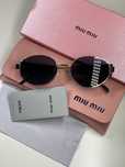Ochelari MIU MIU