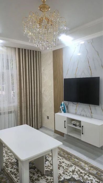 Ялангач 
теннисный корт
Кирпичный дом