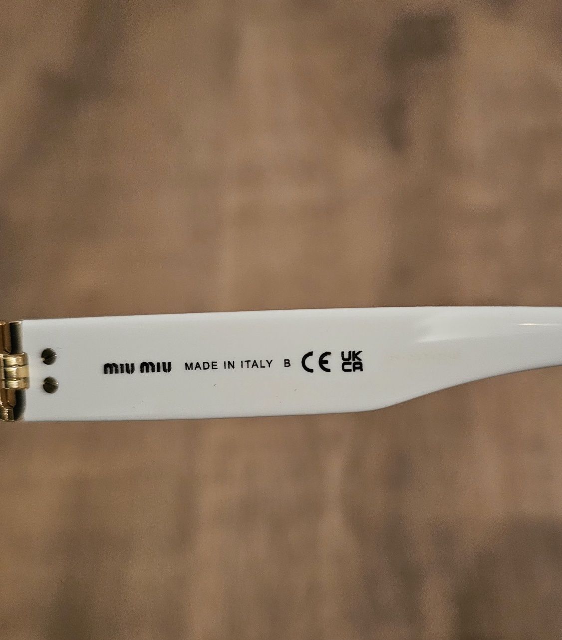 Сънчеви очила miu miu