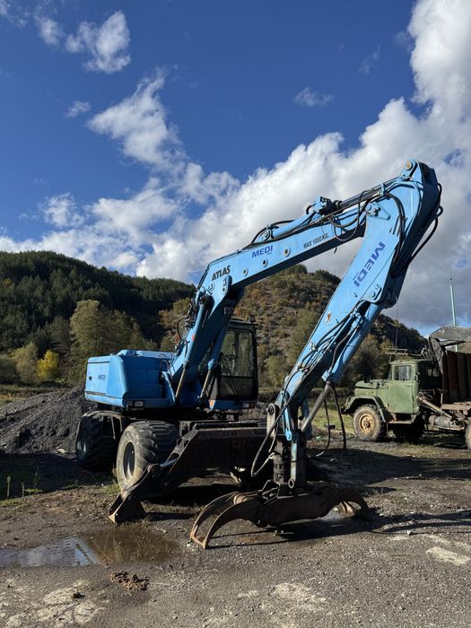 Колесен багер Atlas