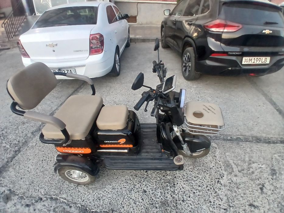 Электроскутер  3 колёсная