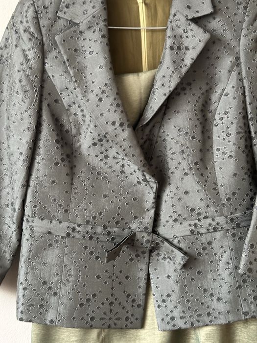 Изискан и стилен тъмнозелен костюм на Mellini fashion