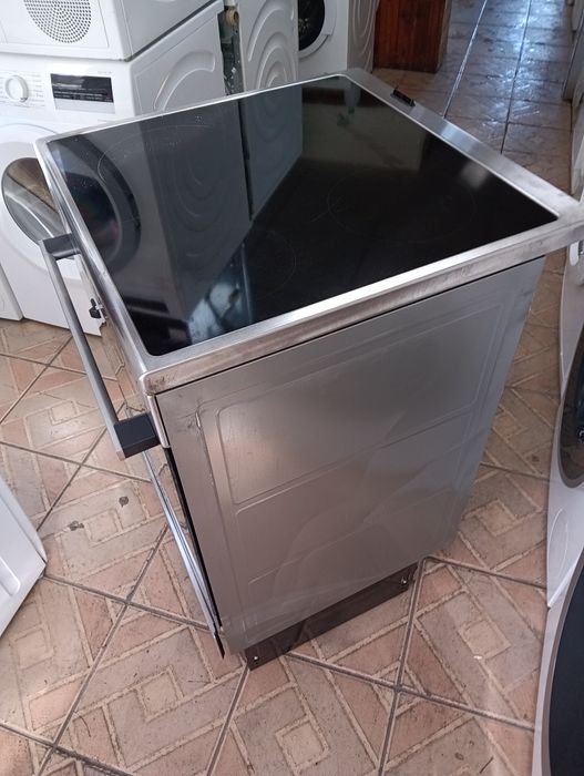 Иноксова свободно стояща печка скерамичен плот VOSS  2 години гаранция