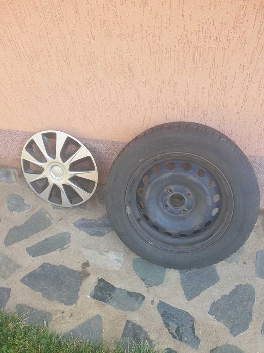 4 Jante Dacia Logan cu cauciucuri de iarna si capace