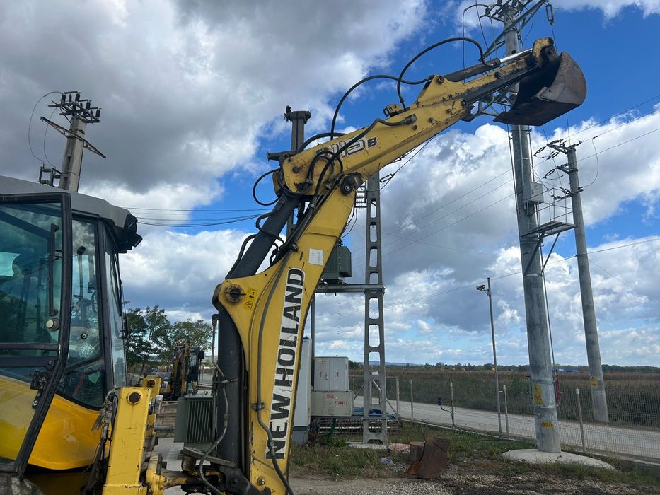 Buldoexcavator new holland B 115 B