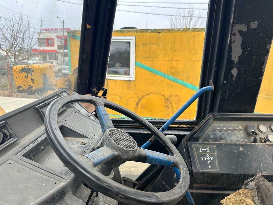 Buldoexcavator Caterpillar 428 variante auto!