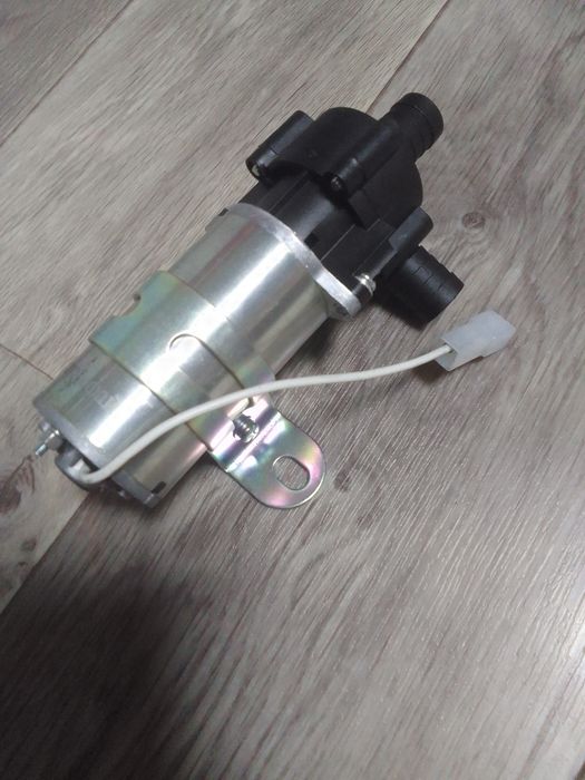 Помпа(новая) дополнительный насос отопителя