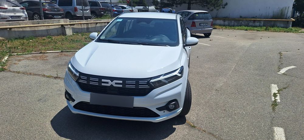 Dacia Logan Două dacia logan cumparate de noi.