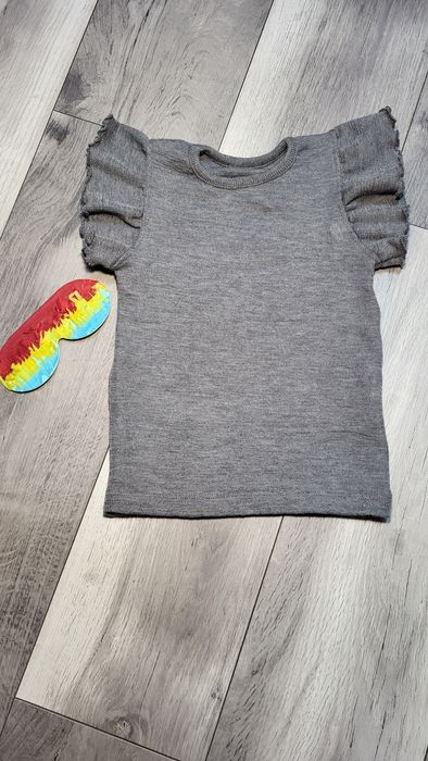 Vestă cu volănașe din lână merinos extrafină