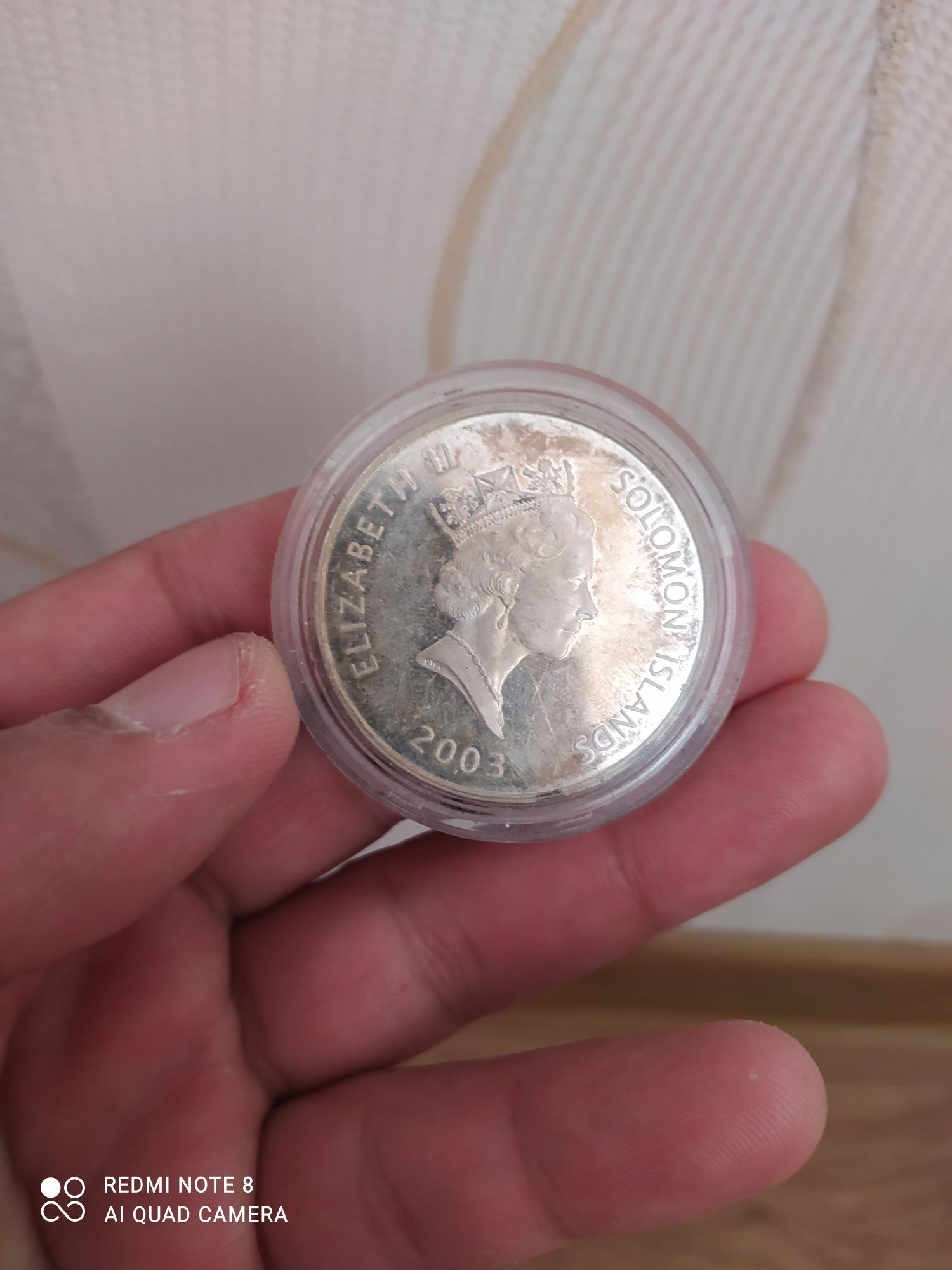 Коллекционная серебряная монета