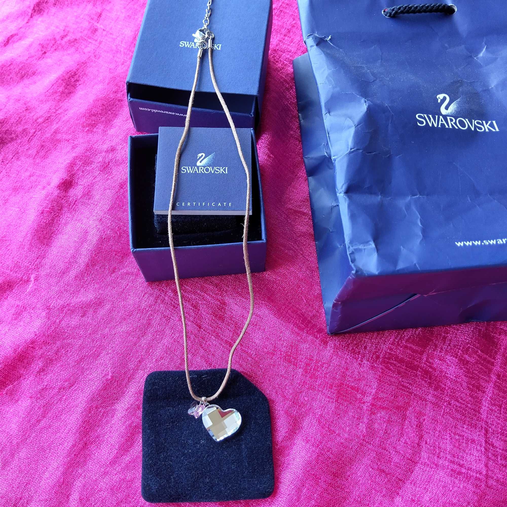 Swarovski колие с висулка сърце и малка пеперудка , използвано