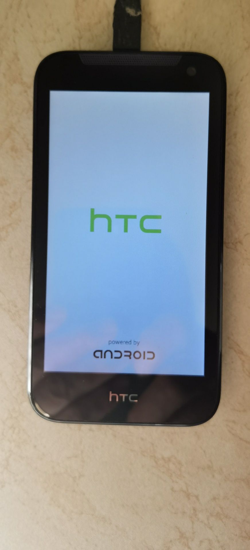 Vand HTC 310 în condiții bune