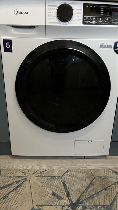 Стиральную машину Midea MFN11W60B