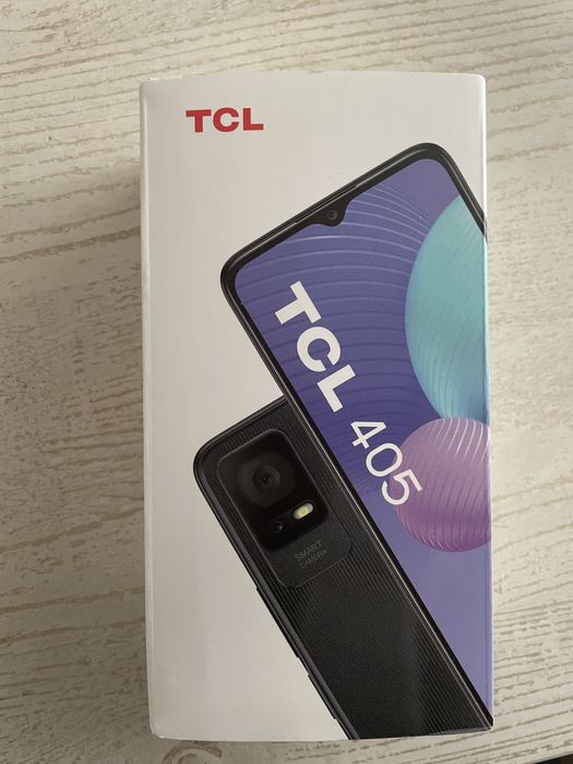 Телефон TCL T506D