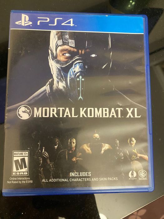 Мортал комбат XL  диск с игрой в идеальном состоянии на PS4.
