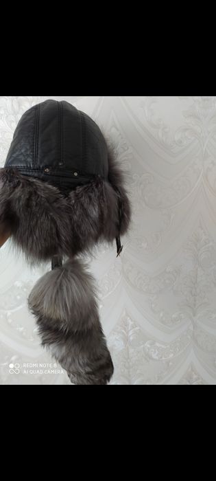 Продам кожаную шапку ушанку с хвостом