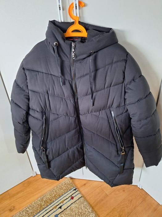 Продам пуховик женский 60 размер