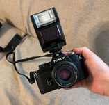 Aparat foto Nikon EM + Obiectiv Nikon + Blitz Nikon  + Geantă Nikon