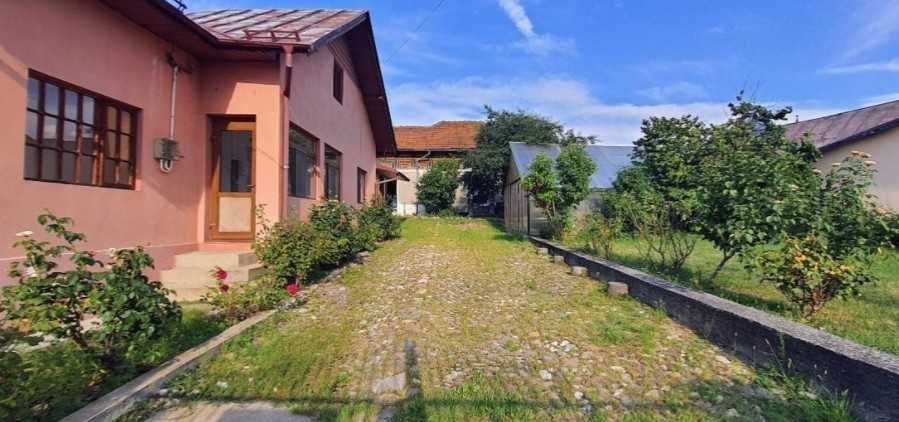 Proprietate 1780m2 cu 2 case/livada/garaj